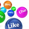 Web and Internet concept with social media and social network signs and words on bouncing colorful spheres isolated on white background.
